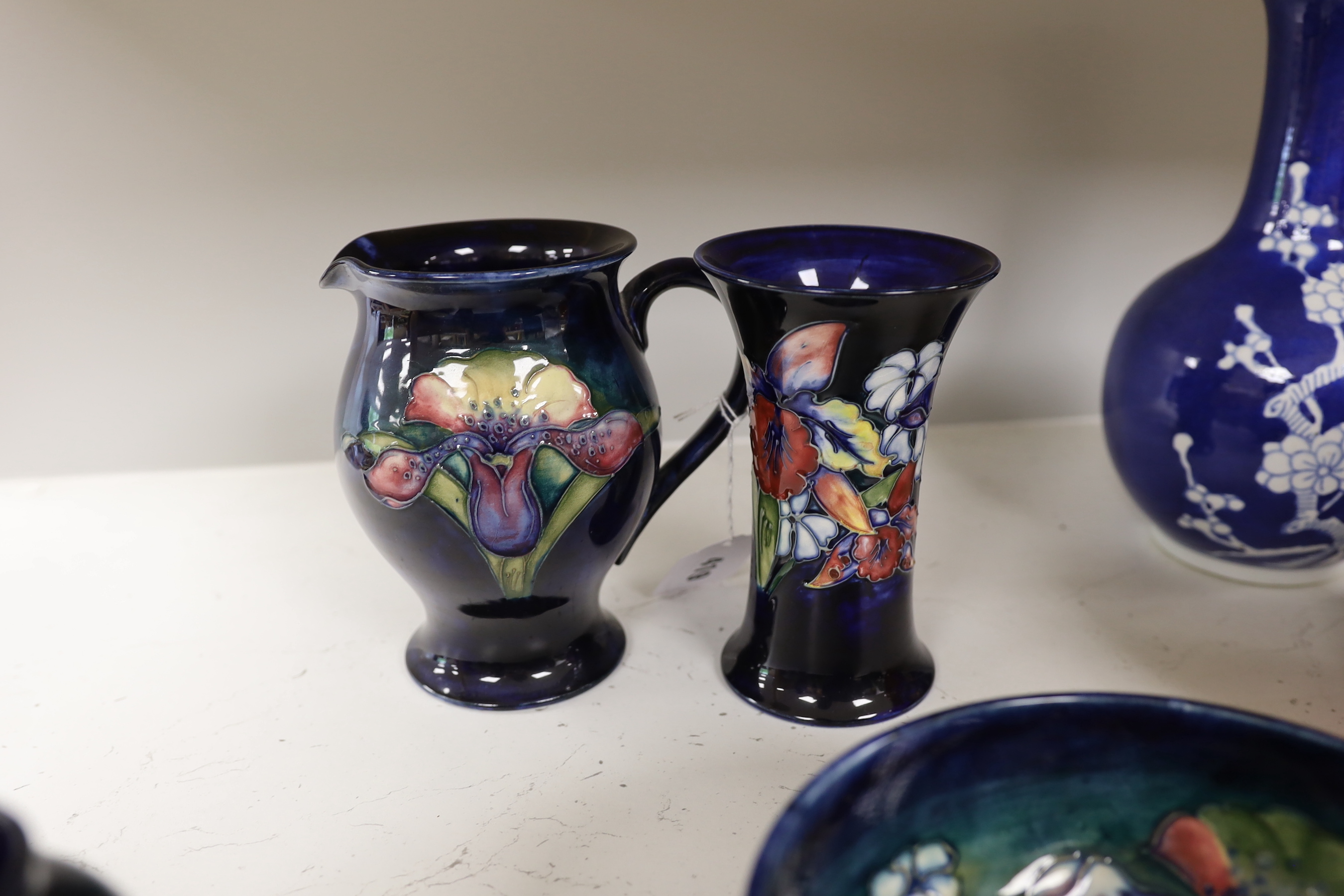 Four pieces of Moorcroft pottery, tallest 15cm